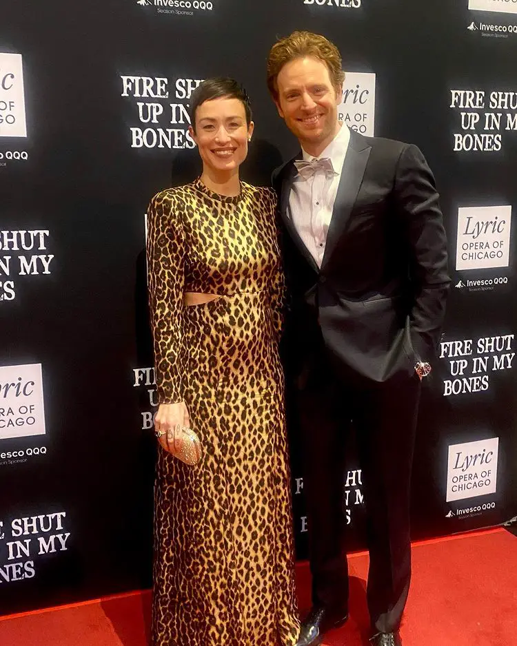 Nick Gehlfuss with his wife, Lilian Matsuda, in March 2022.